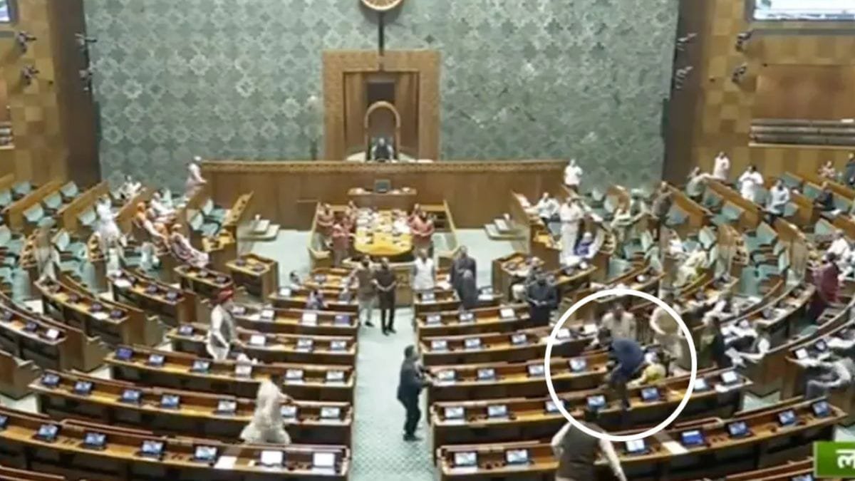Indian Parliament Faces Security Breach as Intruders Throw Smoke Bombs Indian Parliament Faces Security Breach as Intruders Throw Smoke Bombs
